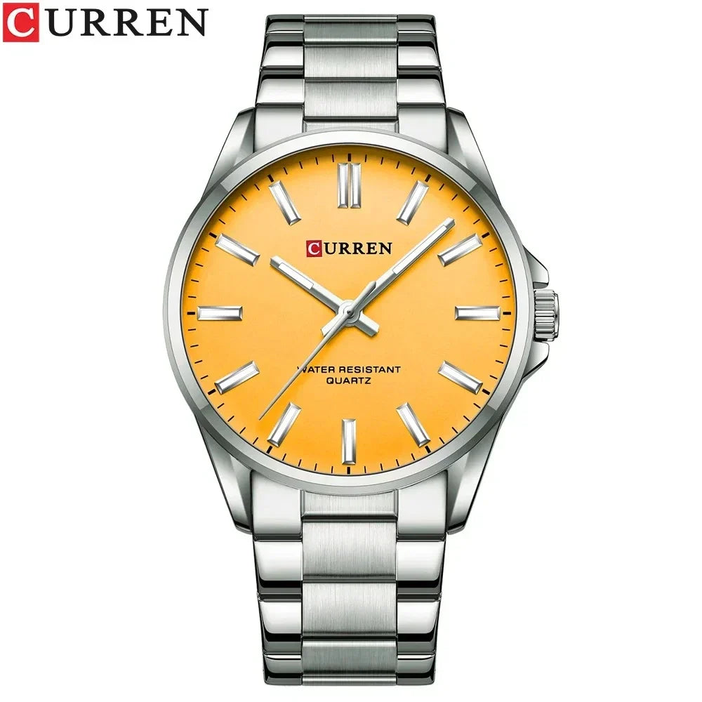 Reloj Curren 9090G de cuarzo con esfera de color Plateado Amarillo, caja y pulsera de acero inoxidable, cristal Hardlex y manecillas luminiscentes para el hombre moderno