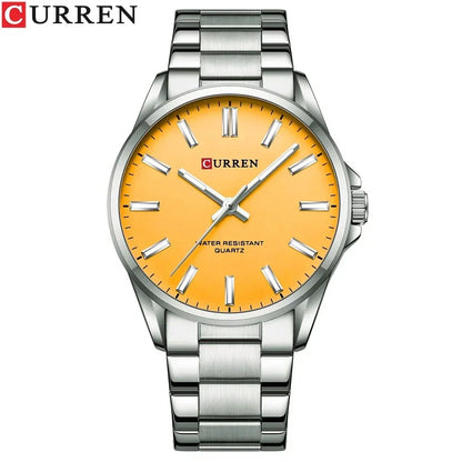 Reloj Curren 9090G de cuarzo con esfera de color Plateado Amarillo, caja y pulsera de acero inoxidable, cristal Hardlex y manecillas luminiscentes para el hombre moderno